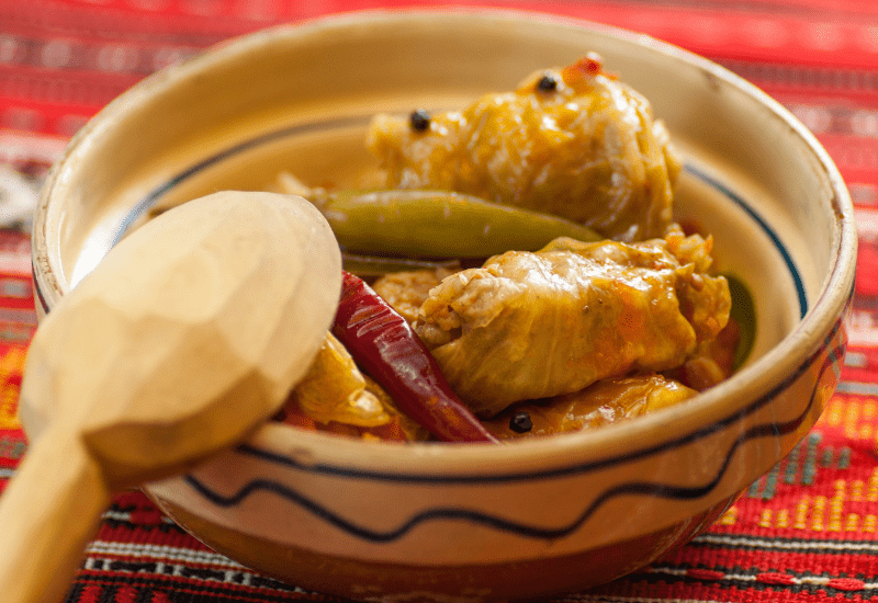 Romanian Traditional Dishes SARMALE CU MĂMĂLIGĂ (Mince Rolled In Pickle Cabbage With Polenta)