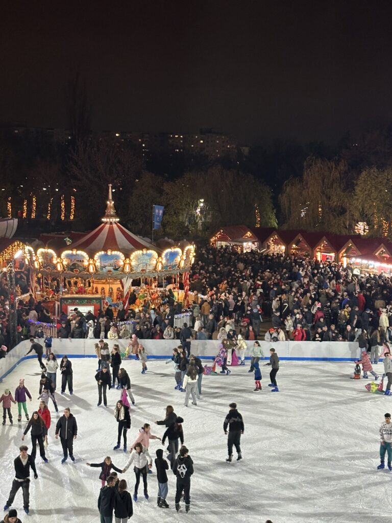ice skating and carousel at West Side Christmas Market