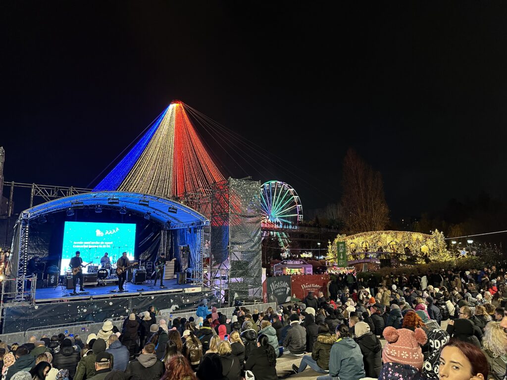 stage, the two bridges and ferris wheel at West Side Christmas Market